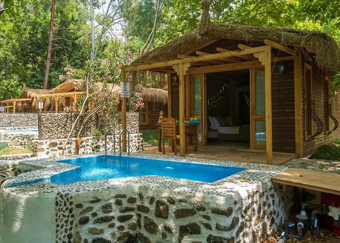 Отель Suna Village &